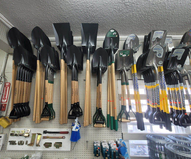 Our wall filled with round point and square shovels with varying handle lengths from Vulcan and Landscapers Select. 